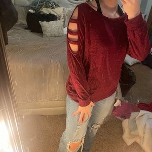 Burgundy long sleeved shirt with cut out details in shoulders